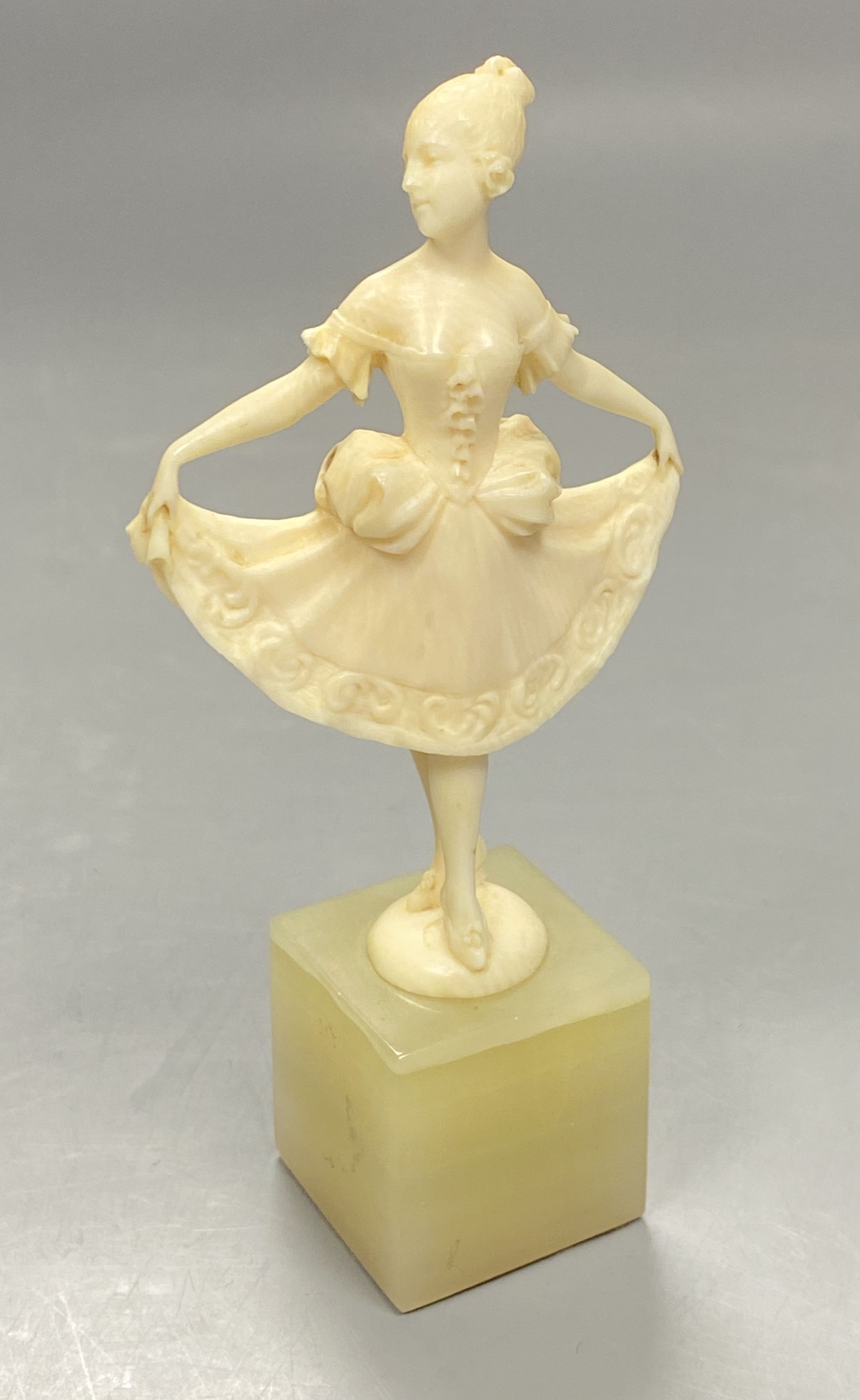 An Art Deco ivory figure of a dancer on an onyx base, height 12cm